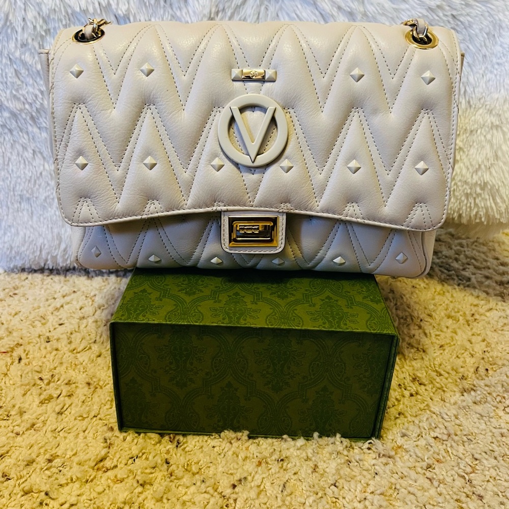 Valentino large studded clutch bag.